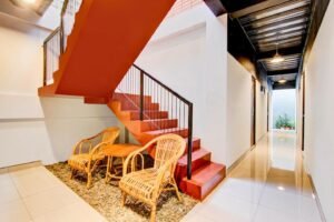 Bagian tangga dan kursi santai rubina syariah hotel